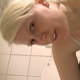 A fat, blonde, German girl takes a massive shit into her commode while straddling it. About 2.5 minutes.
